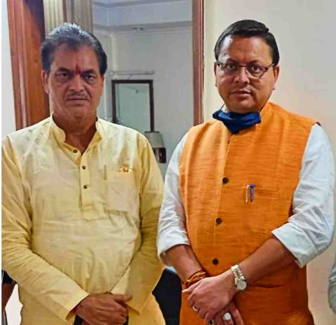 puhskar singh dhami with prem chand agrawal