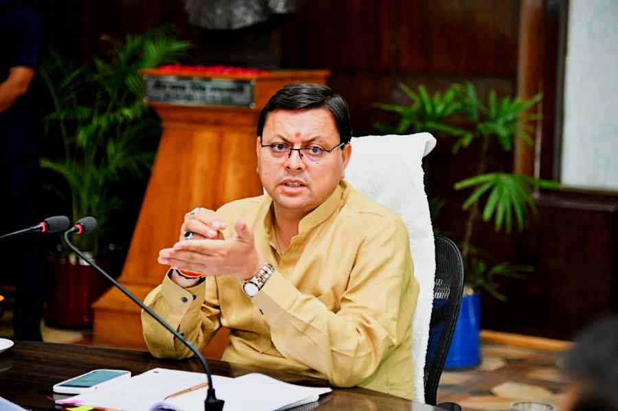 cm dhami profile in meeting in action