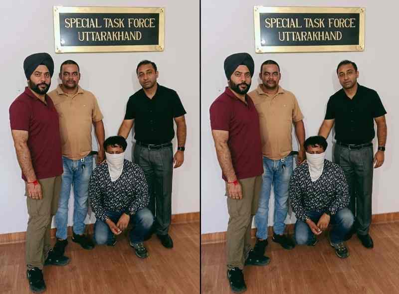 STF ARRESTED TEACHER UKSSSC PAPER SCAM