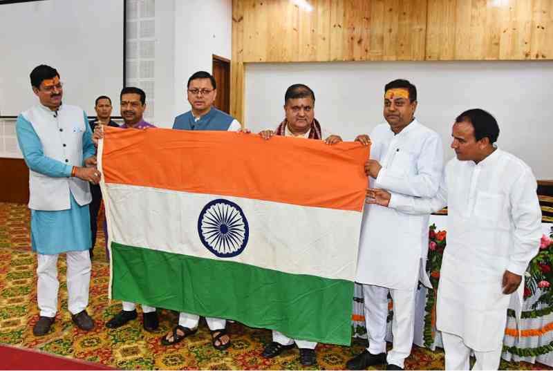 cm dhami with tiranga and sambit patra