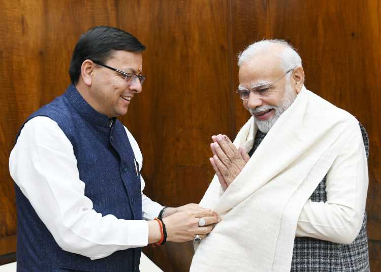 cm dhami with pm modi