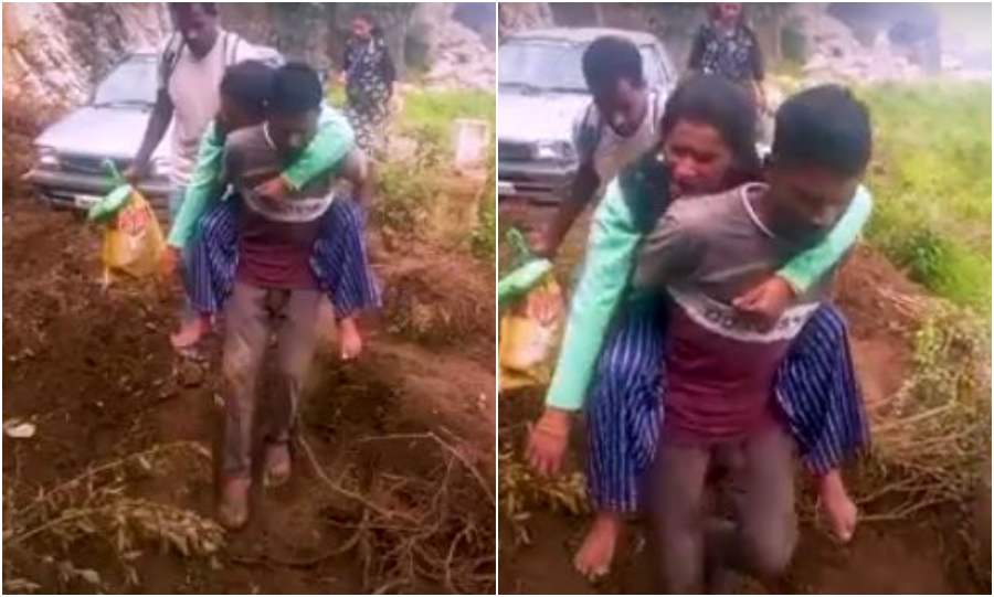पीठ पर बिठाकर सड़क कराई पार