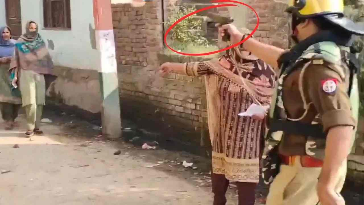 Revolvers shown to voters in UP, voters stopped from casting their votes.