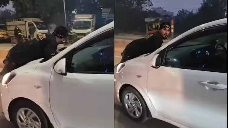 /moradabad man-lying-in car-bonnet video viral